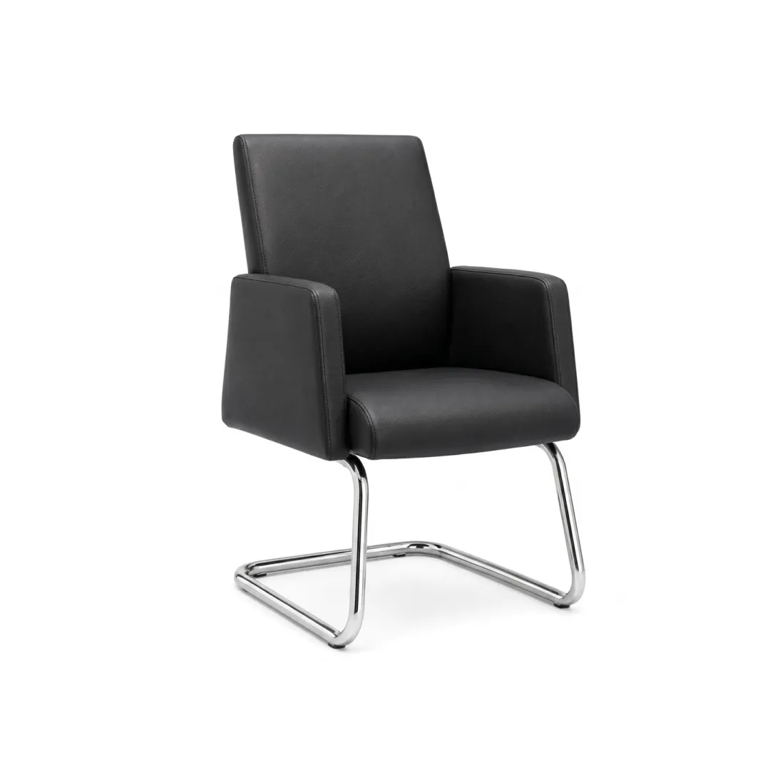 Eagle Visitor Chair | Compact Reception Base | officerepublic Eagle Visitor Chair arranged beside an executive desk in a modern room