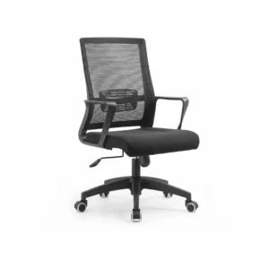 Element Staff Chair rolled up to a sleek modern office workstation