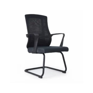 Elite Visitor Chair placed beside a modern dark wood office consultation desk