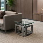 Infinity Corner Table positioned beside a leather executive guest chair