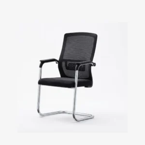 Jasper Visitor Chair positioned neatly beside a contemporary executive office desk
